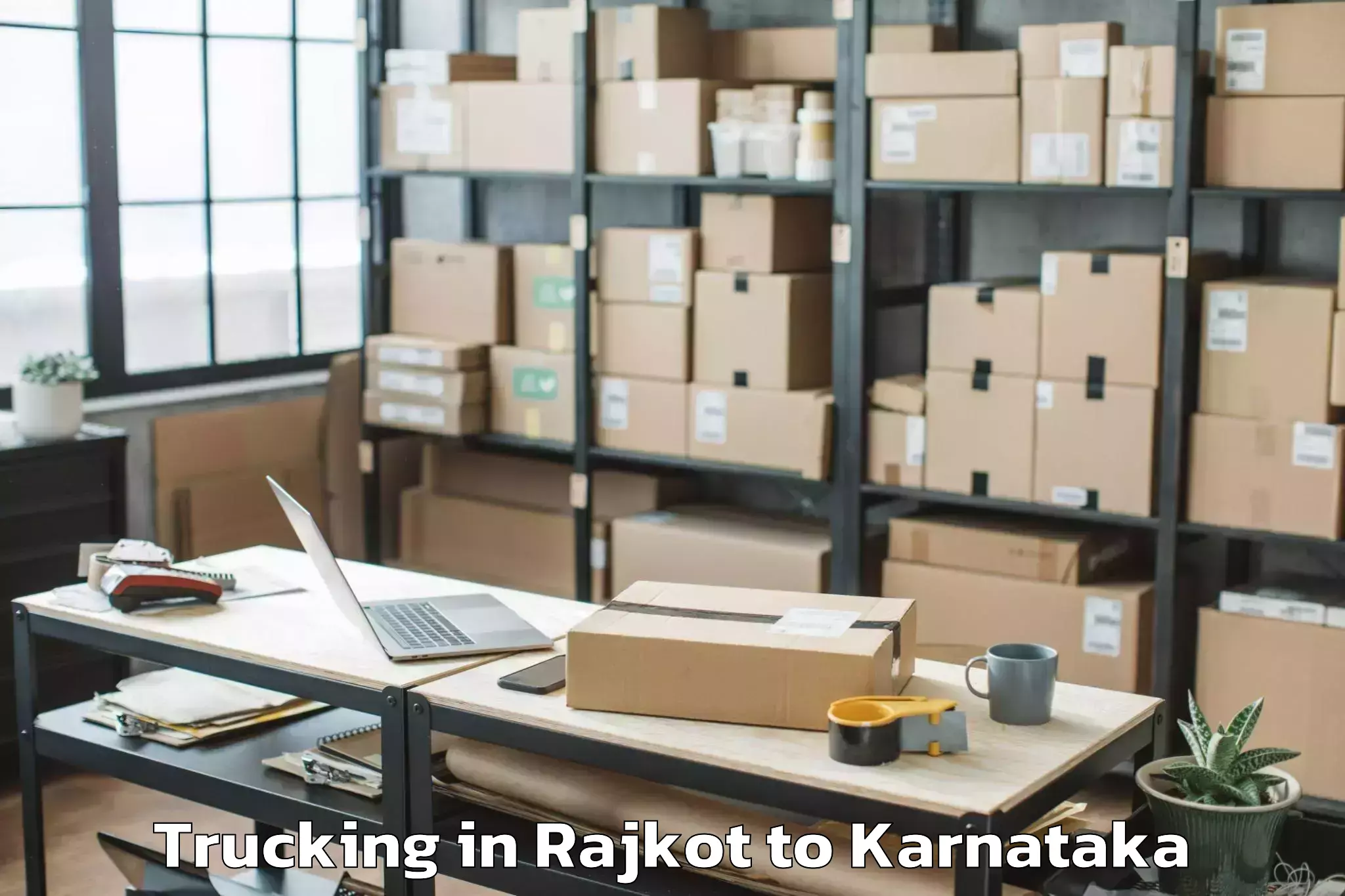 Reliable Rajkot to Ganagapura Trucking